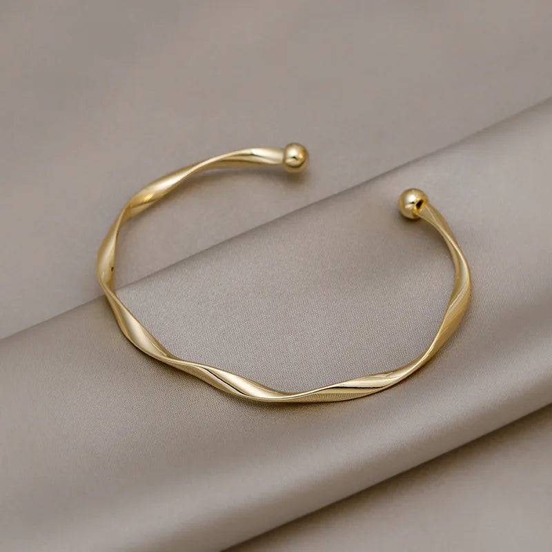 Pulsera Dorada Trenzada