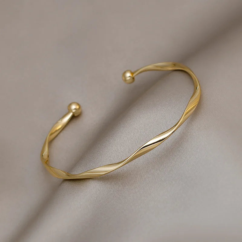 Pulsera Dorada Trenzada